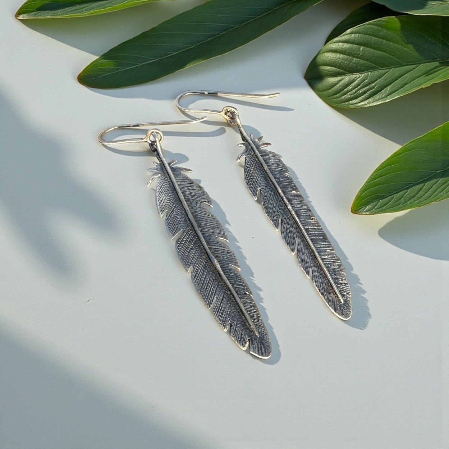 Birds of a Feather-Large Silver Feather Earrings